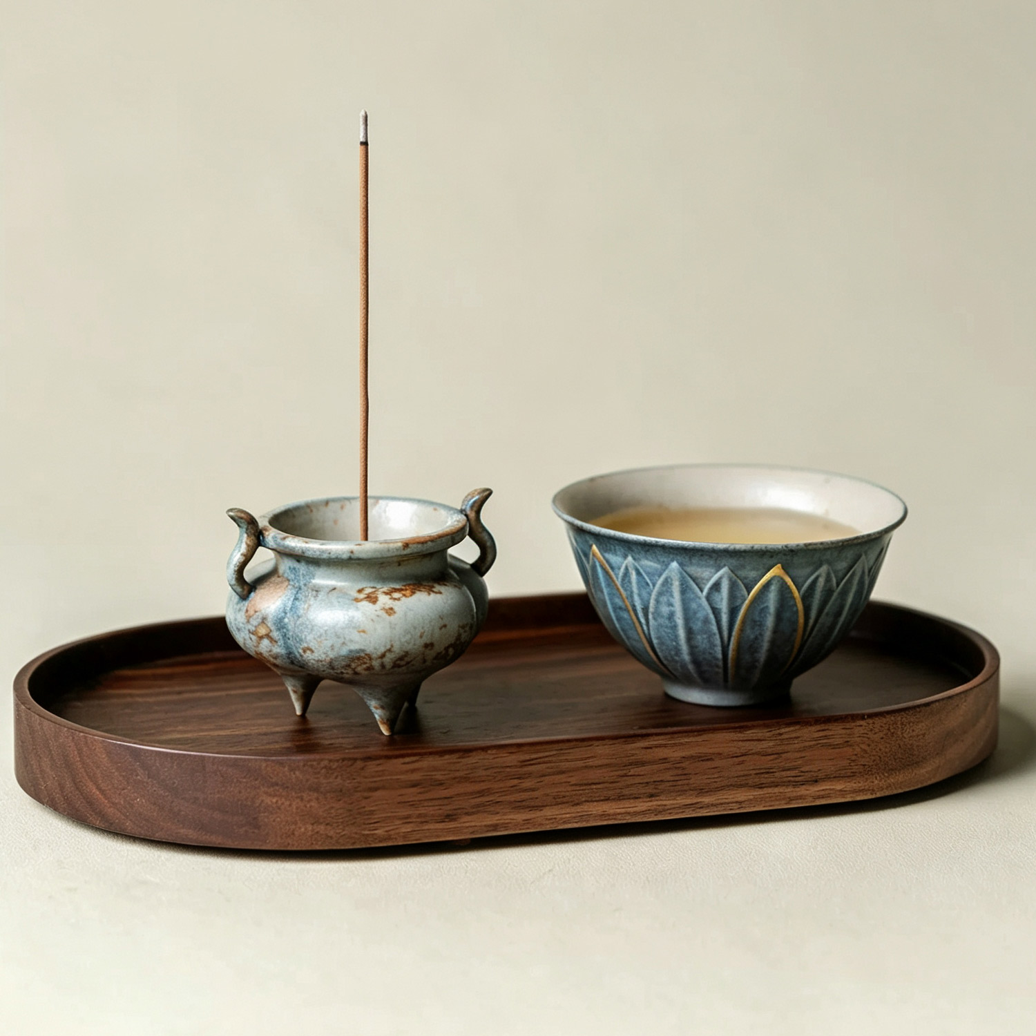 Bottom view showing three tripod feet of vintage ceramic incense burner