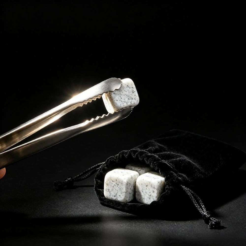 Stainless steel tongs and storage bag for whiskey stone set